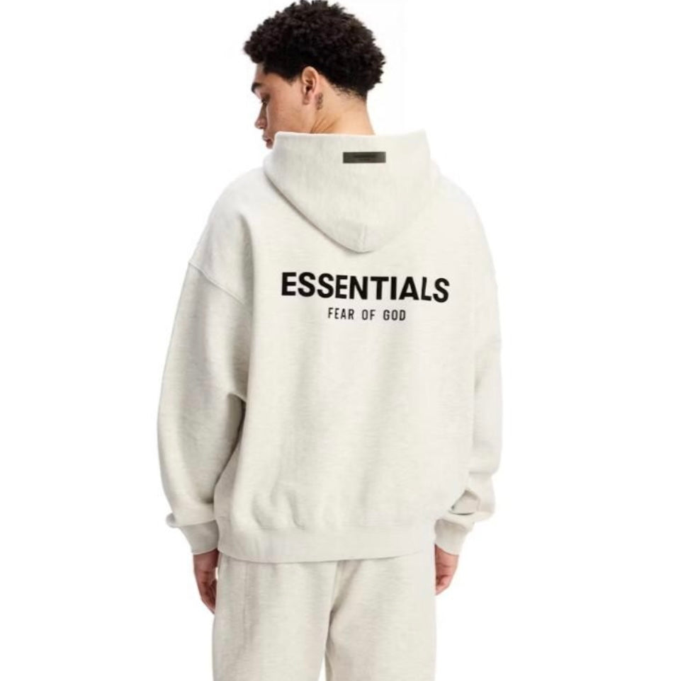 Affordable and cheap Essentials-style hoodie front view premium Fear of God oversized fit in the color white light oatmeal
