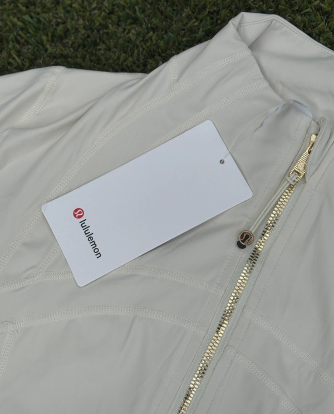 Lululemon White jacket with gold zipper 