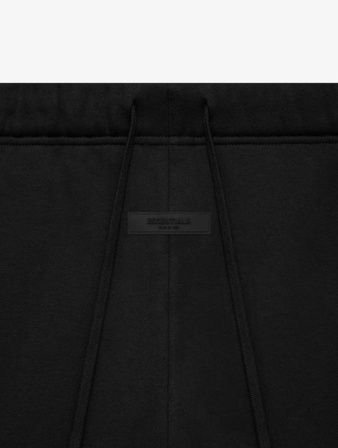 close up stitching of logo essentials