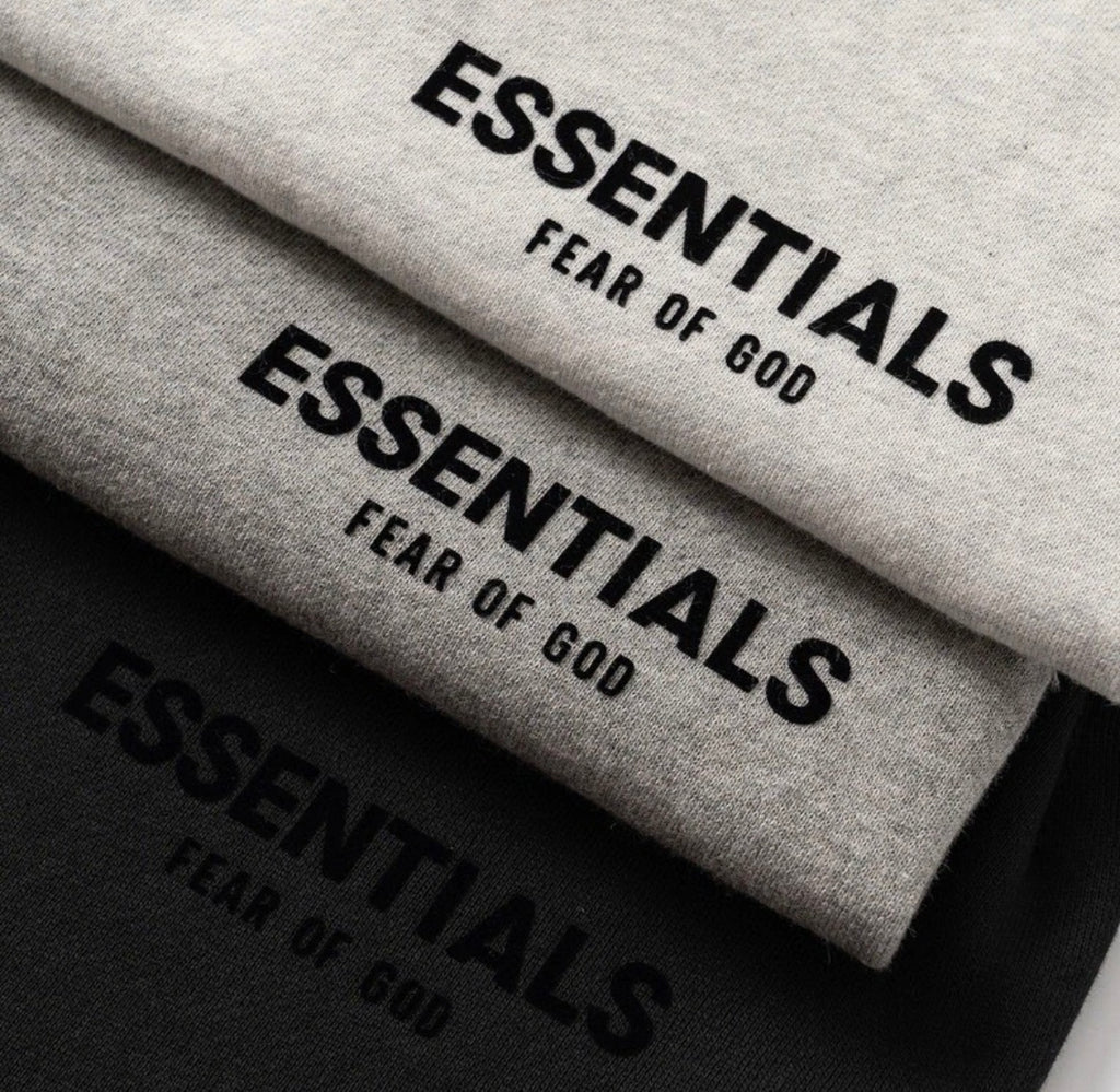 close ups on essentials hoodies details and lettering