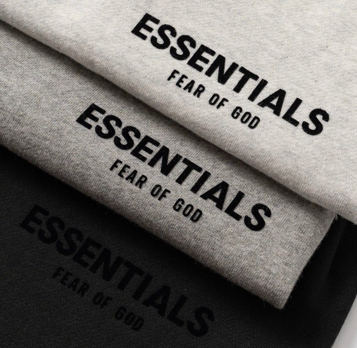 close ups on essentials hoodies details and lettering